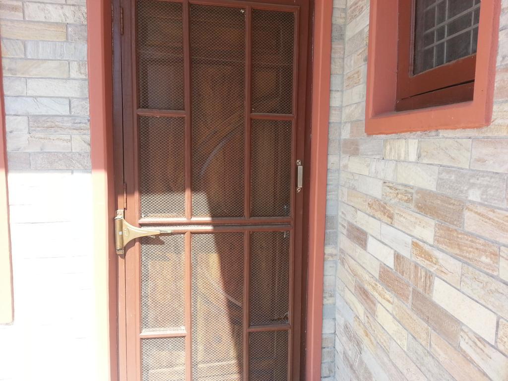 بوكْرا Namaste Apartments الغرفة الصورة